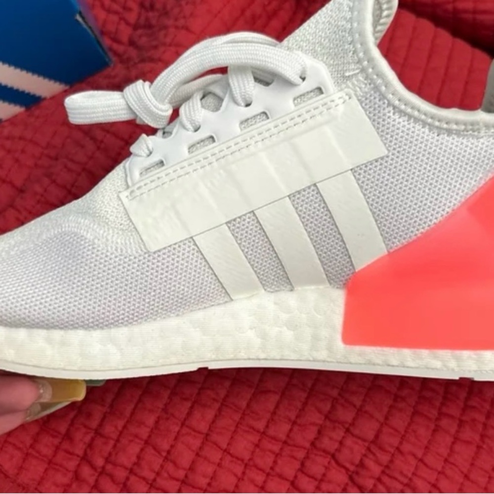 Brand new never worn NMD’s women’s size 7, new with tags in box